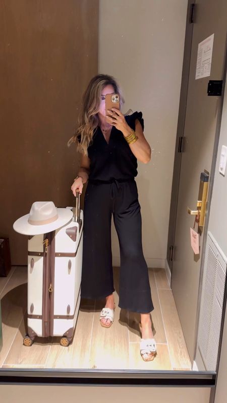 (Use code JANUARY10 for discount) Traveled by car 4 hours in this jumpsuit today. So comfy! 10/10 🙌🏻 Black knit jumpsuit with flutter sleeves and kick flare hem, Gibsonlook, travel outfit, spring outfit, summer outfit, sandals 

#LTKstyletip #LTKVideo #LTKtravel