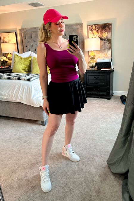 Wearing size 8 in the skirt 
Medium in tank