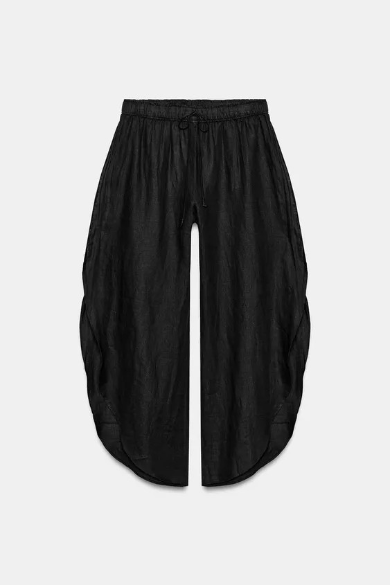 ZARA WOMAN COLLECTIONTrousers with a main fabric made of 100% linen. Featuring a mid-waist and an... | Zara US