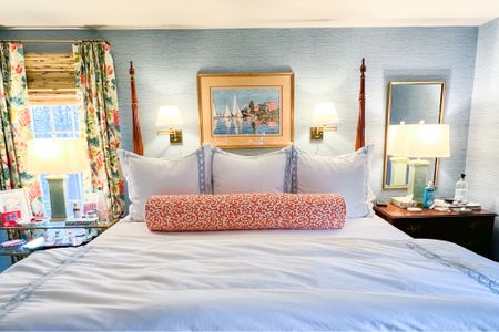 Linking what I can from our bedroom: faux grasscloth in the prettiest blue wallpaper, shams and duvet with cane embroidery, affordable Amazon sconces, affordable Amazon glass side table/console  