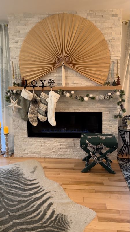 ✨Mantle Magic coming in hot 🔥

🤍You’re going to want to save this one so you can refer back when you get into the holiday decorating spirit. 

Want to create your own mantle masterpiece? 
It’s so easy!  Just grab … 
✨command hooks
✨garland x 2 
✨stockings 
✨stocking hangers 
✨candle sticks 
✨bottle brush tress or any trees you like that fit on hour mantle 
✨paper stars or velvet bows 
✨20mins of Christmas jams & creative energy 

Et viola 🪄
🛍️everything is linked for you in my LTK shop from Amazon so you can get everything in and enjoy some hot cocoa infront of your magic mantle this weekend 🎁

#mantledecor #mantlestyling #christmasmantle #christmasstyle #christmasstocking #holidaycheer #holidaymagic #makehomemagical #makehomeyoursanctuary #familyhomes #cozyhomestyle #modernmama #homelover #eclectichomedecor #midcenturyhome 


#LTKhome #LTKSeasonal #LTKHoliday