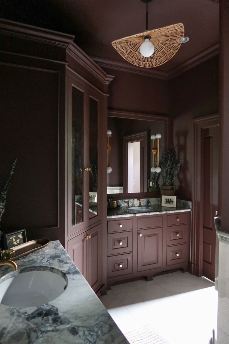 I love this bathroom so much! It gets very little natural light so instead of fighting it, I leaned into it with a dark, moody color - velvety chocolate with a hint of wine. The coverage is excellent and the finish is so smooth. Pinecone Path was so stunning I decided to paint the ceilings, trim and walls in the same rich chocolate tone. I am so happy with how it turned out! 

#LTKover40 #LTKhome