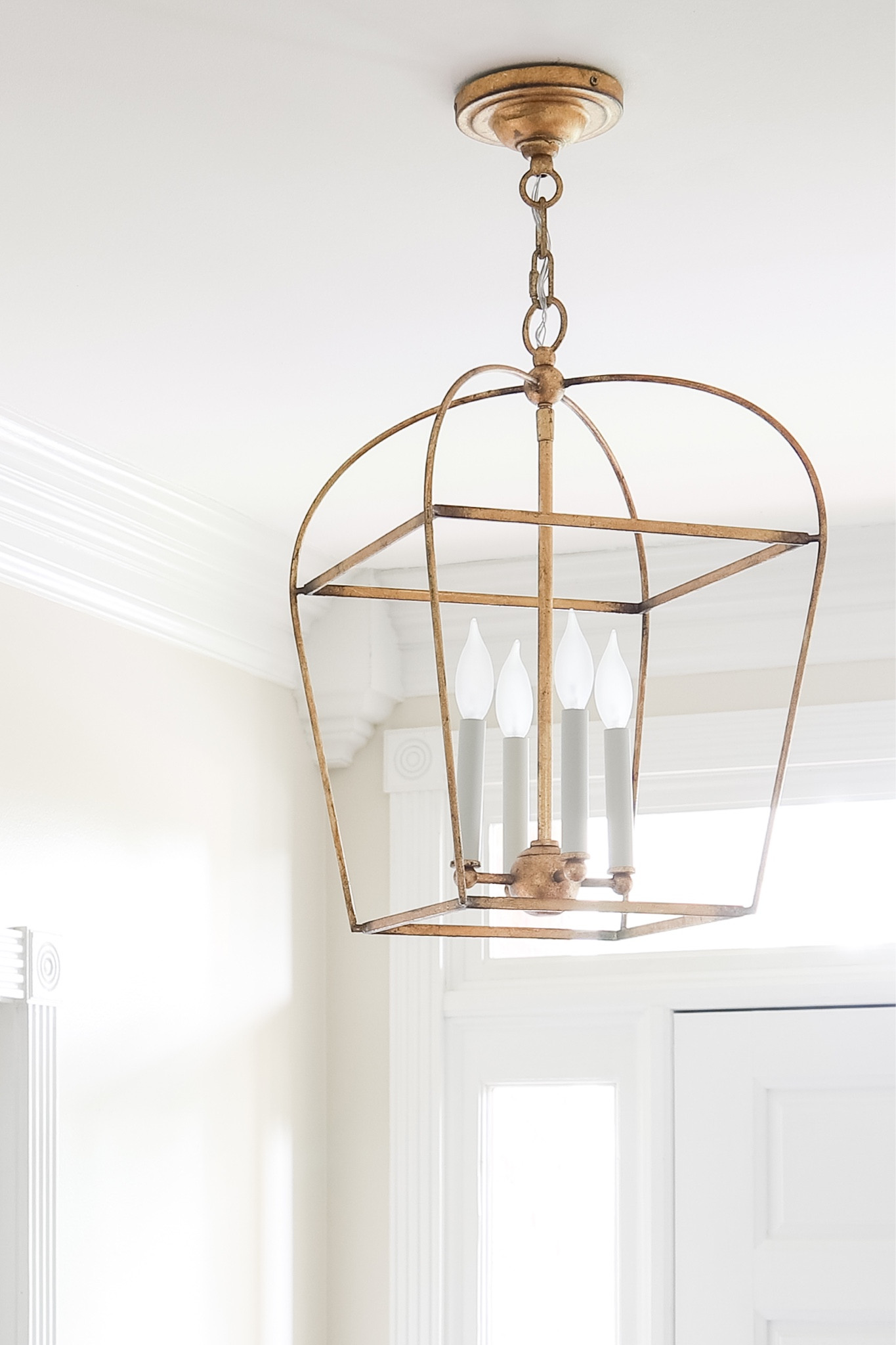 Beautiful brass pendant light in our entryway! 

#LTKhome