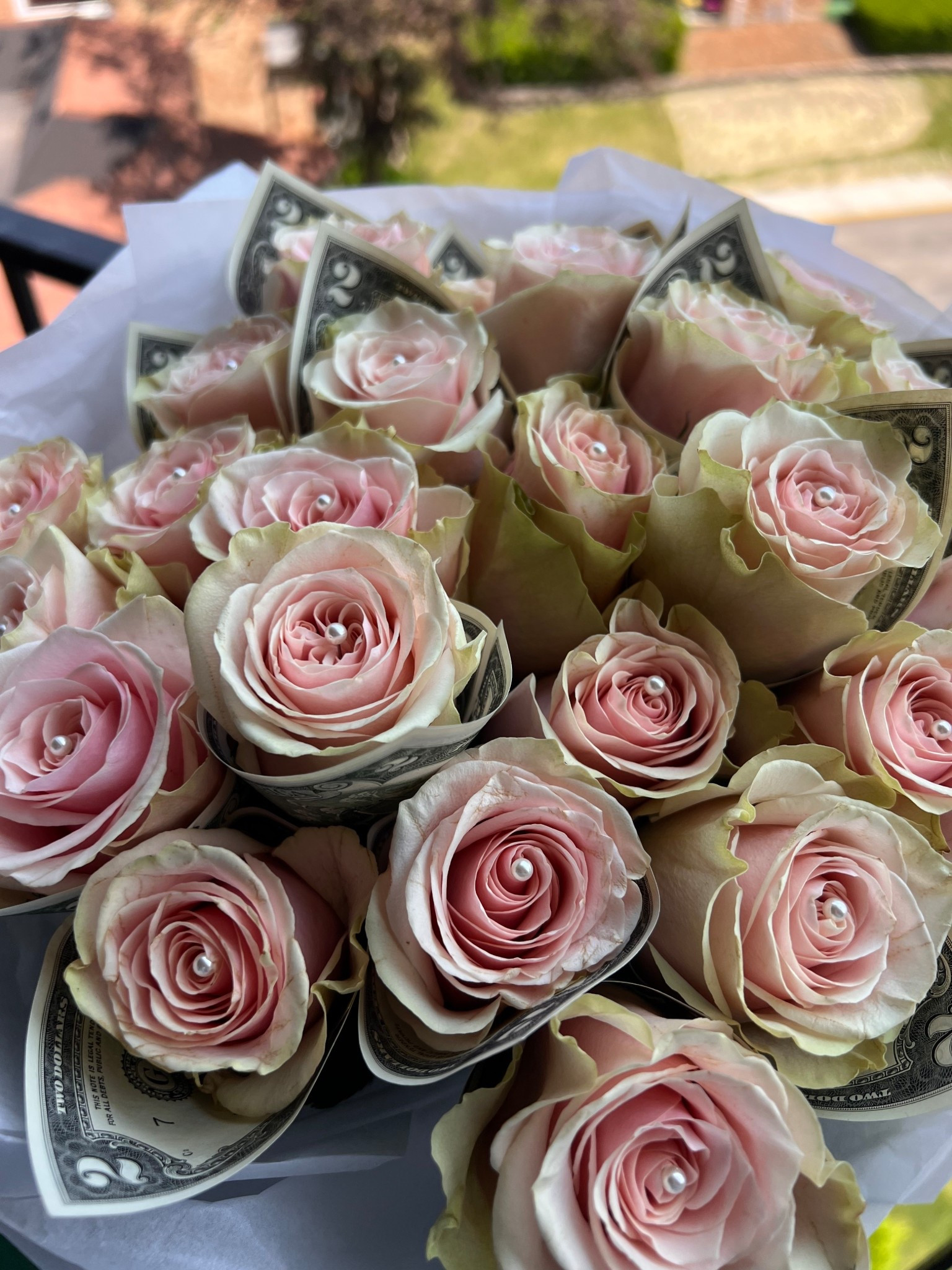 DIY graduation roses with $2 bill and pearls

#LTKSummerEdit #LTKSeasonal #LTKGiftGuide