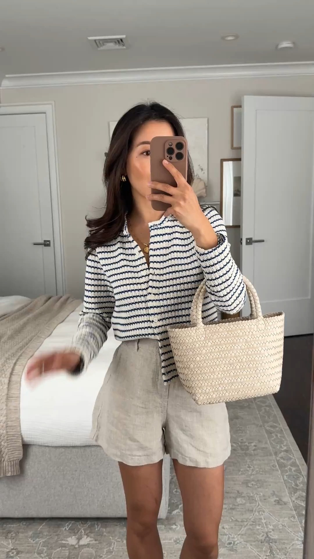 Size info below 
• linen shorts 00, TTS, classic fit with stretch back waist, petite friendly length 
• Crochet cardigan sweater TTS. I sized up to XS for a more relaxed fit to wear it as a light jacket but my usual size would also be fine. 
• Woven mini tote 
• Strappy sandals sz 5.5 

@madewell #madewellpartner #ad Easy summer outfit, mom style, petite friendly shorts, striped cardigan

#LTKPetite #LTKootd #LTKSeasonal