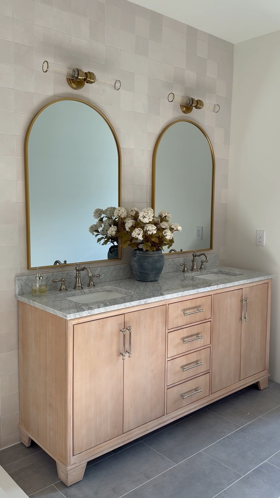 Florals. Contempee. Bathroom mirror.  Vanity. Sconces. Polished nickel. Vase. Neutral design. Primary bathroom  

#LTKHome