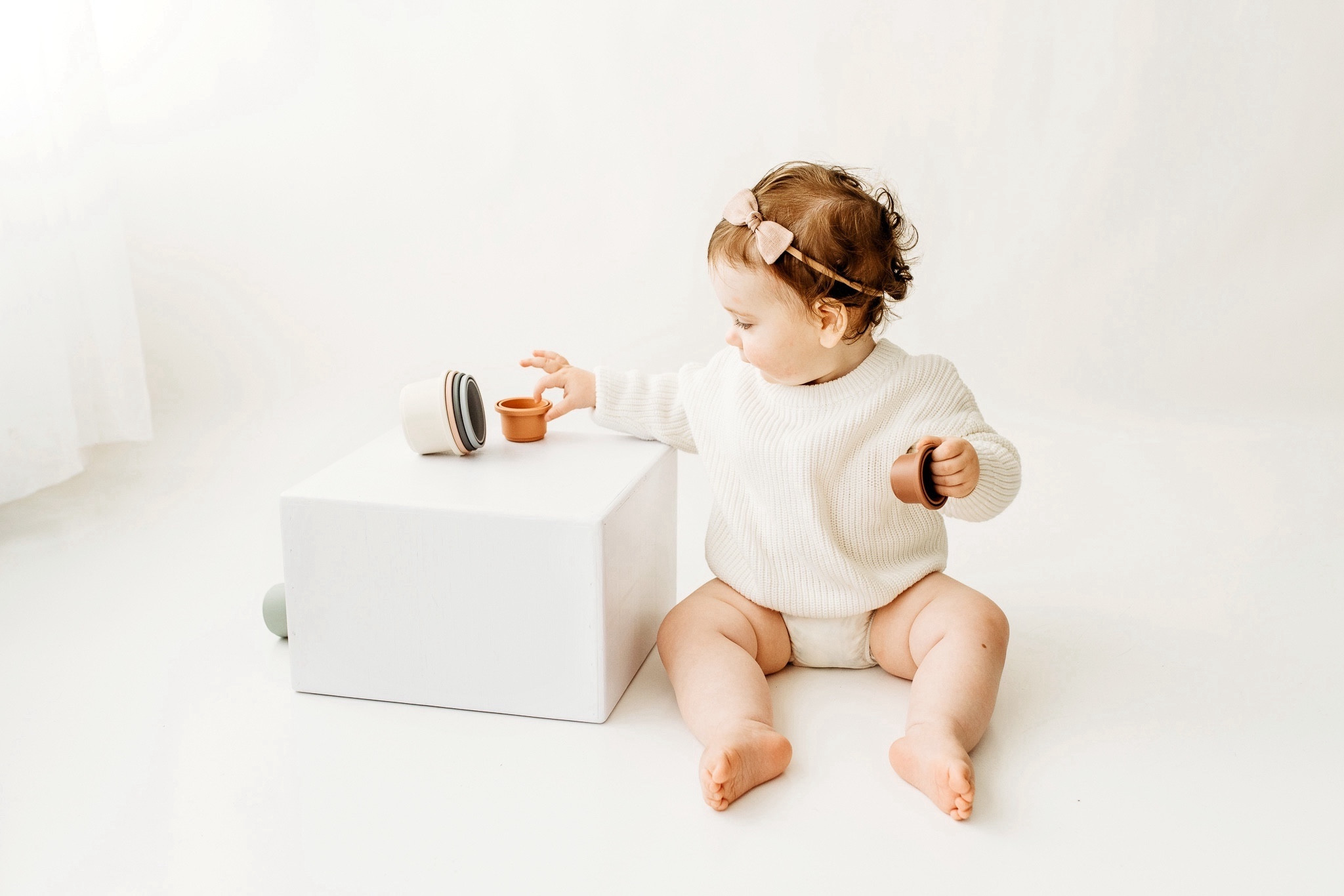 Mushie stacking cups are the best toy, and also the best studio prop! Also love our minimalist linen bow headbands from withloveDJP!

#LTKfindsunder50 #LTKhome #LTKbaby
