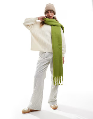 ASOS DESIGN fluffy tassel scarf in green | ASOS (Global)