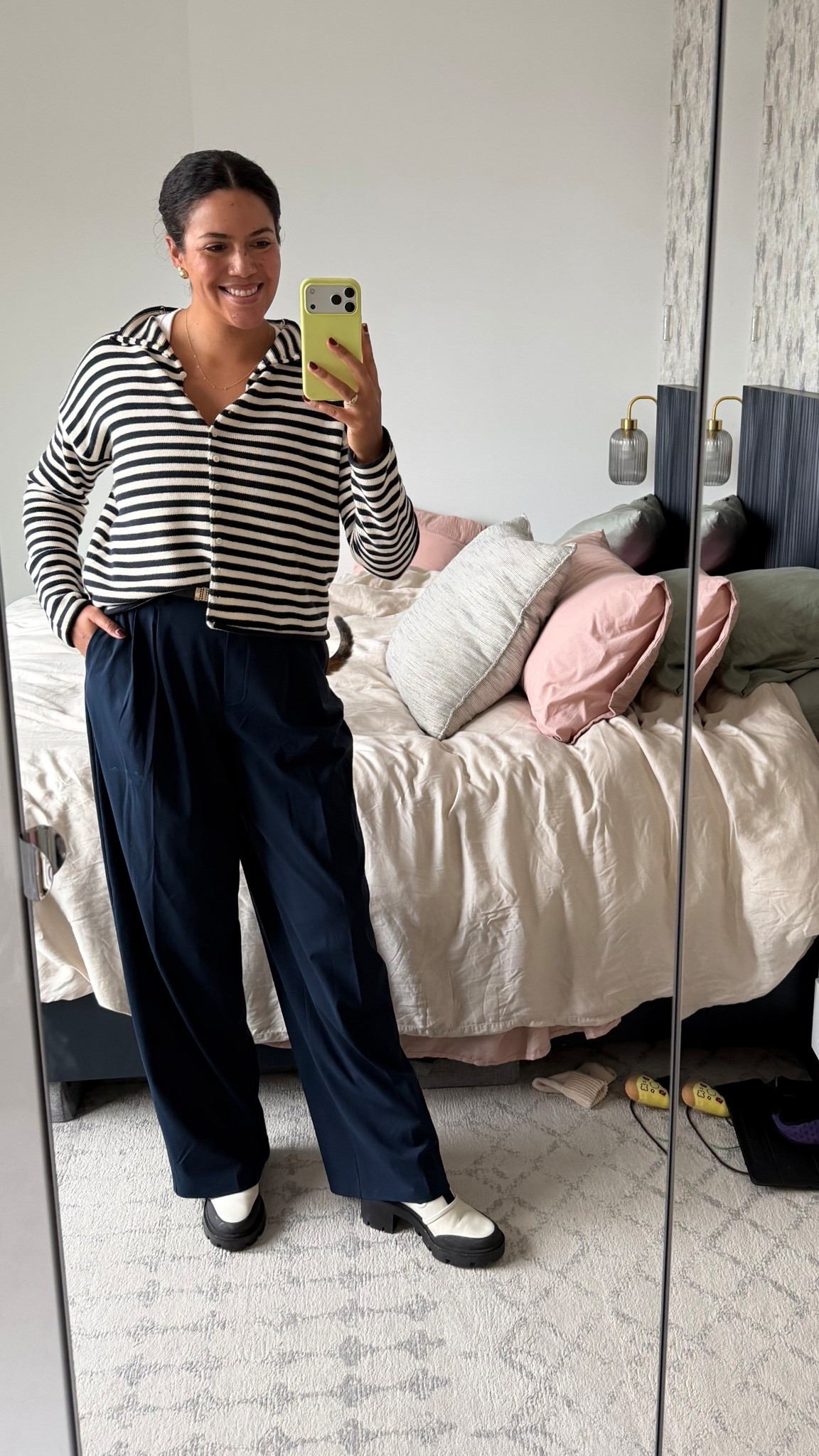 An office outfit that’s a bit more elevated (but ps these slacks are pull-ons!) while still being casual and cozy. 

Striped Alex Mill cardigan (buttoned up to wear like a crewneck sweater). Size L, TTS. 
Lululemon slacks 
Tory Burch platform boots
Accessories from Amazon

#LTKMidsize #LTKTall #LTKWorkwear
