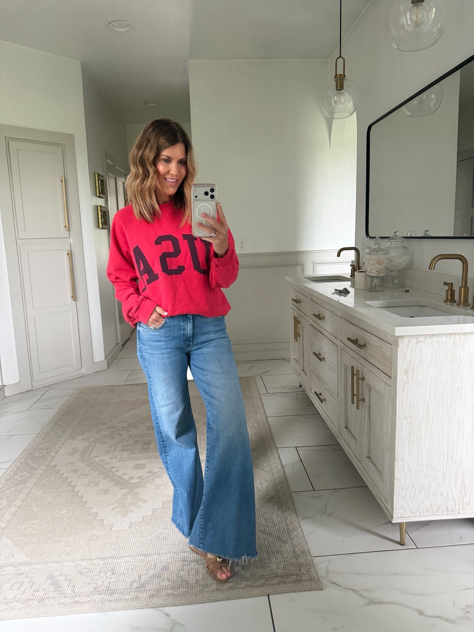 Code SPOILEHOME20 
Medium sweatshirt and size 27 jeans. Favorite Mother jeans the Hustler Roller Sneak high rise wide leg in size 27 
@anthropologie #anthropartner

#LTKOver40 #LTKSaleAlert