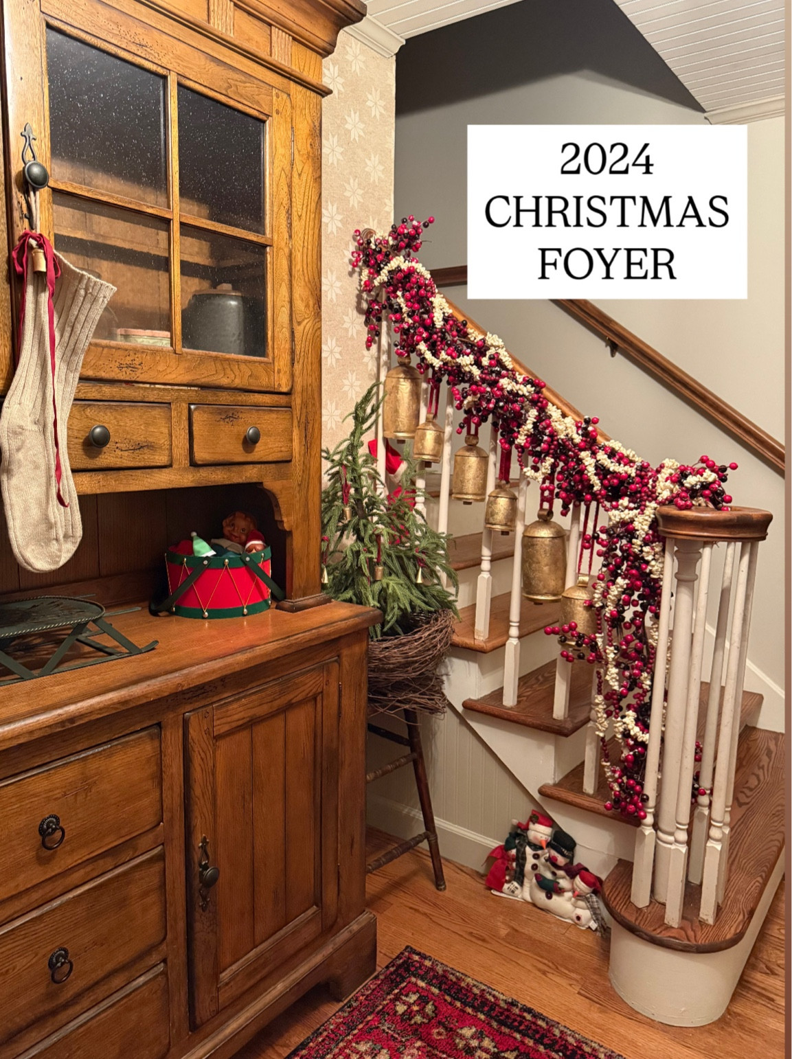 Christmas foyer with bells, faux popcorn & cranberry garland, and frosted cranberry garland. I’d get that at hobby lobby or Michaels, but I’ll link some for you  

#LTKHome #LTKSeasonal #LTKHoliday