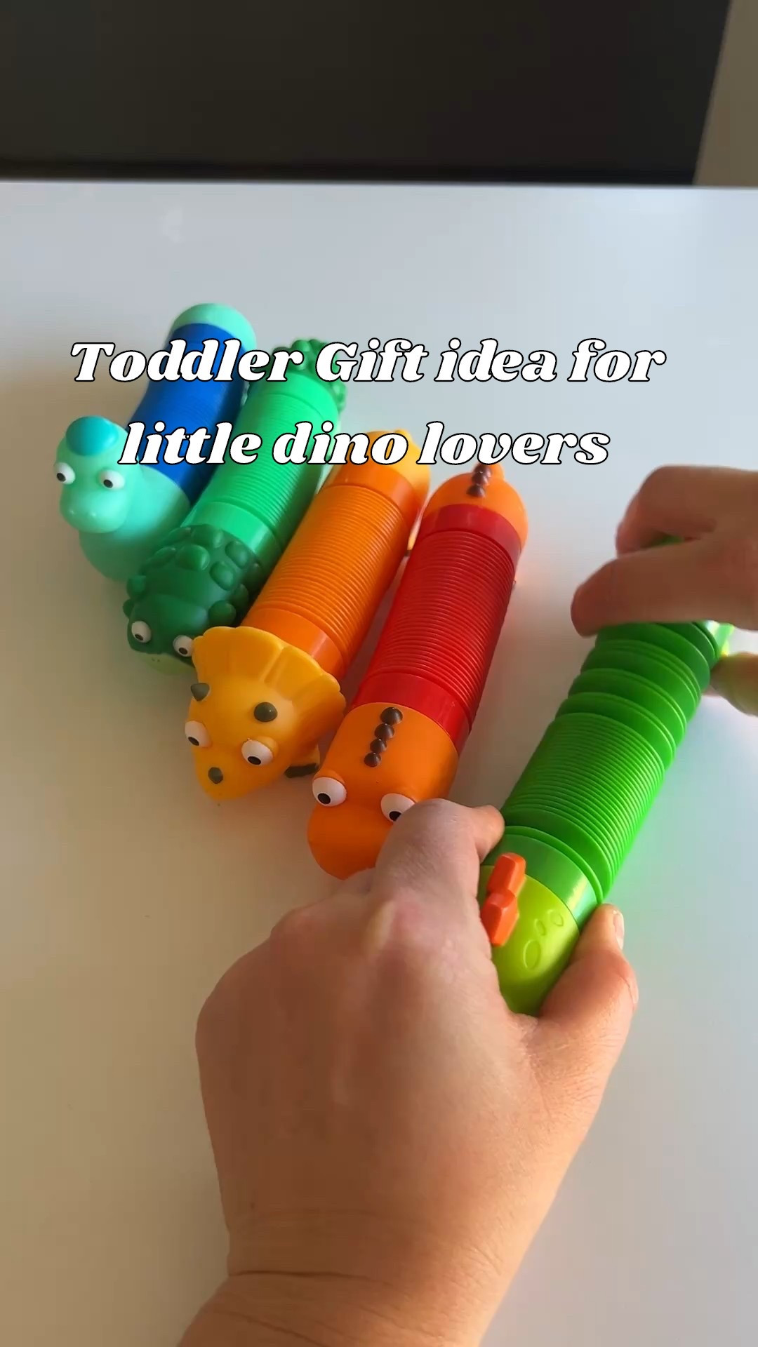 These lil dino buddies are both pop toy and sensory tube. They make a great toddler gift or travel toy. 

#LTKGiftGuide #LTKKids #LTKCyberWeek