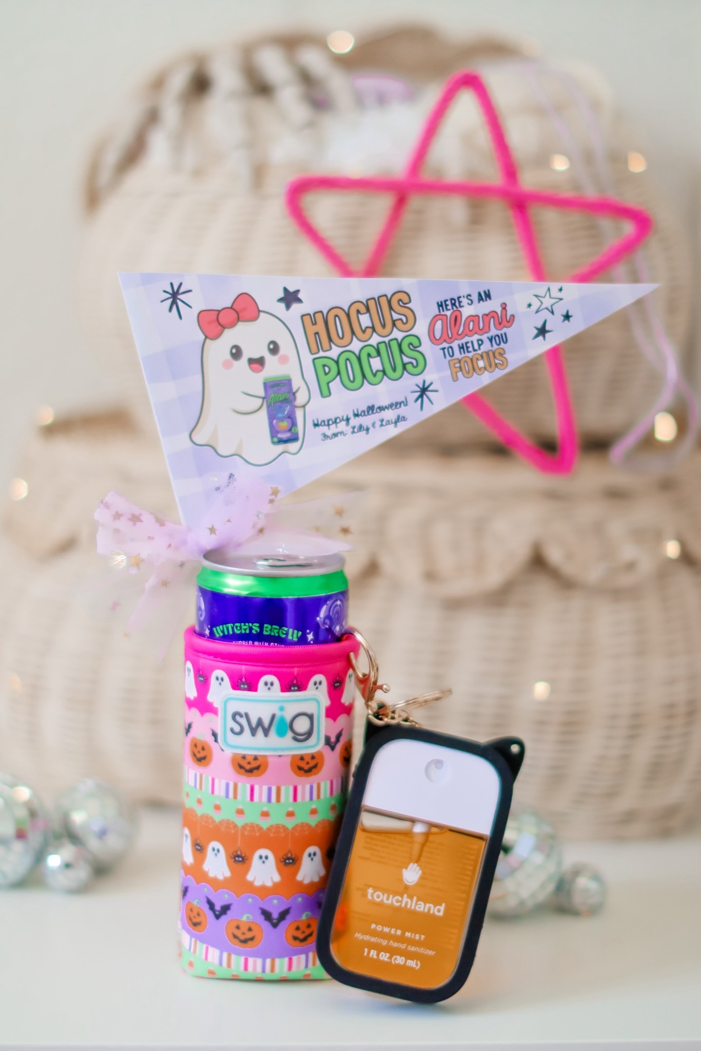 Teacher Gift Idea for Halloween: HOCUS POCUS! Here’s an Alani to help you focus! I made this gift special by adding the cutest coolie for a Witch’s Brew Alani, a touchland hand sanitizer with a black cat keychain, and an adorable pennant to top it off! 🎃🐈‍⬛👻

#LTKSeasonal #LTKKids #LTKHalloween