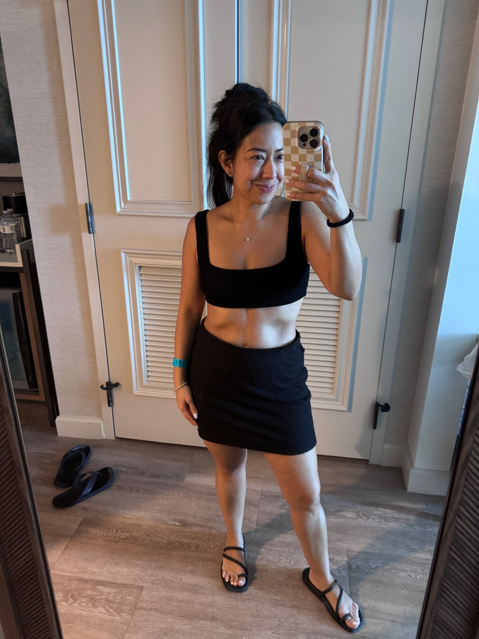 Today’s swim look. 
Black bikini from show me your mumu. Size Medium (tts for swimsuits- I always size up to medium). 
Swim concerto skirt matches the bikini swimsuit. Size medium. It’s a little big but small would be too tight. 
Sandals are crocs. Tts. 
We took a boat ride and spent the day on a private island with a beach. 
Vacation. Travel. 

#LTKTravel #LTKPetite #LTKSwim