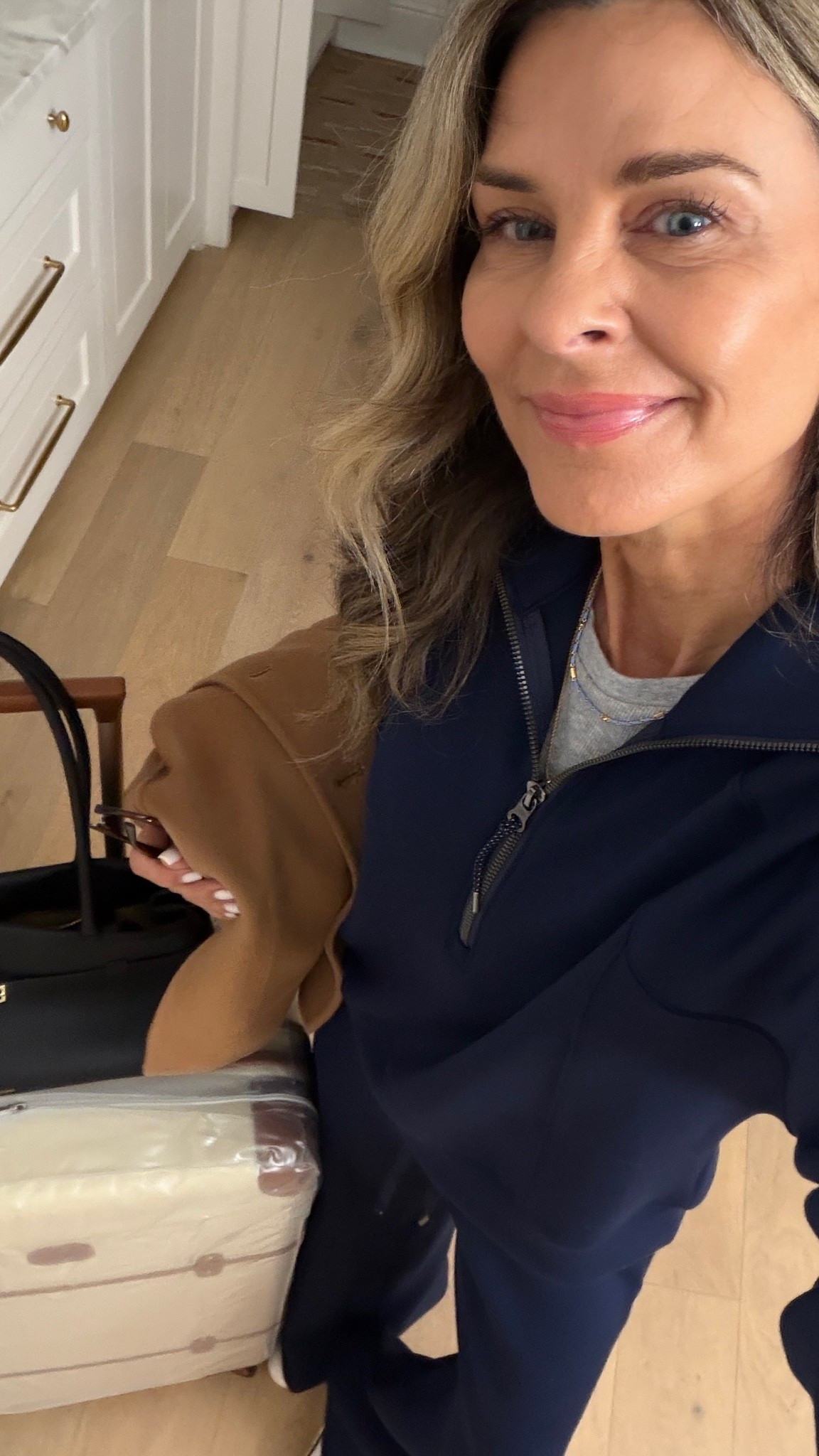 Navy spanx set. Code fashionedlifexspanx sz S top & XS Reg length bottoms
-jacket I’ve had my eye on for a year! It’s oversized and gorgeous! 
-chic bag
-Glowy serum foundation 
-sheer red lip

#LTKootd #LTKOver40 #LTKTravel
