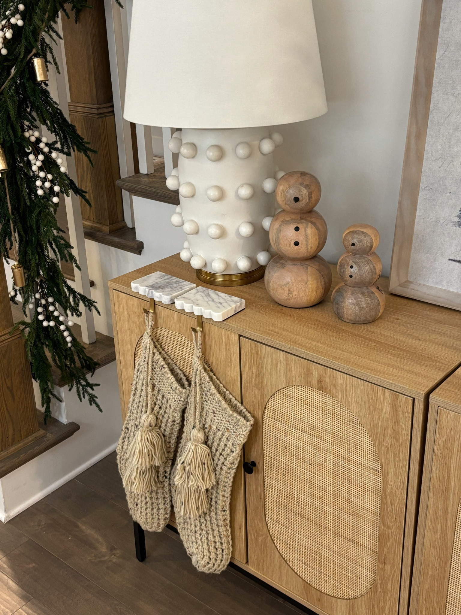 Christmas sideboard decor 

Neutral Christmas decor 
Wooden snowman 
Walmart Christmas tree art
Target knit woven stockings

#LTKCyberWeek #LTKHome #LTKHoliday