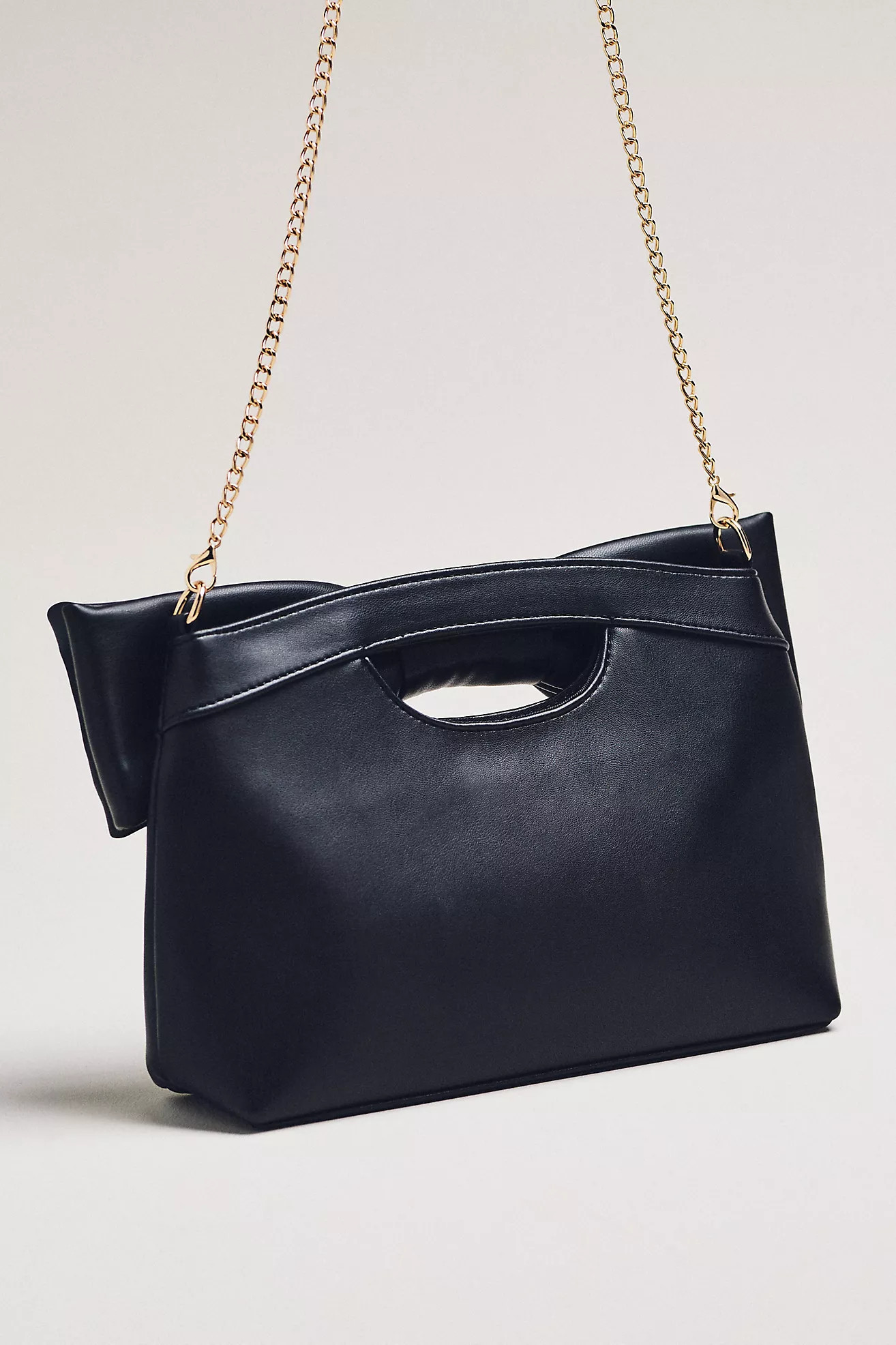 Cutout Handle Bow Clutch | Anthropologie (US)