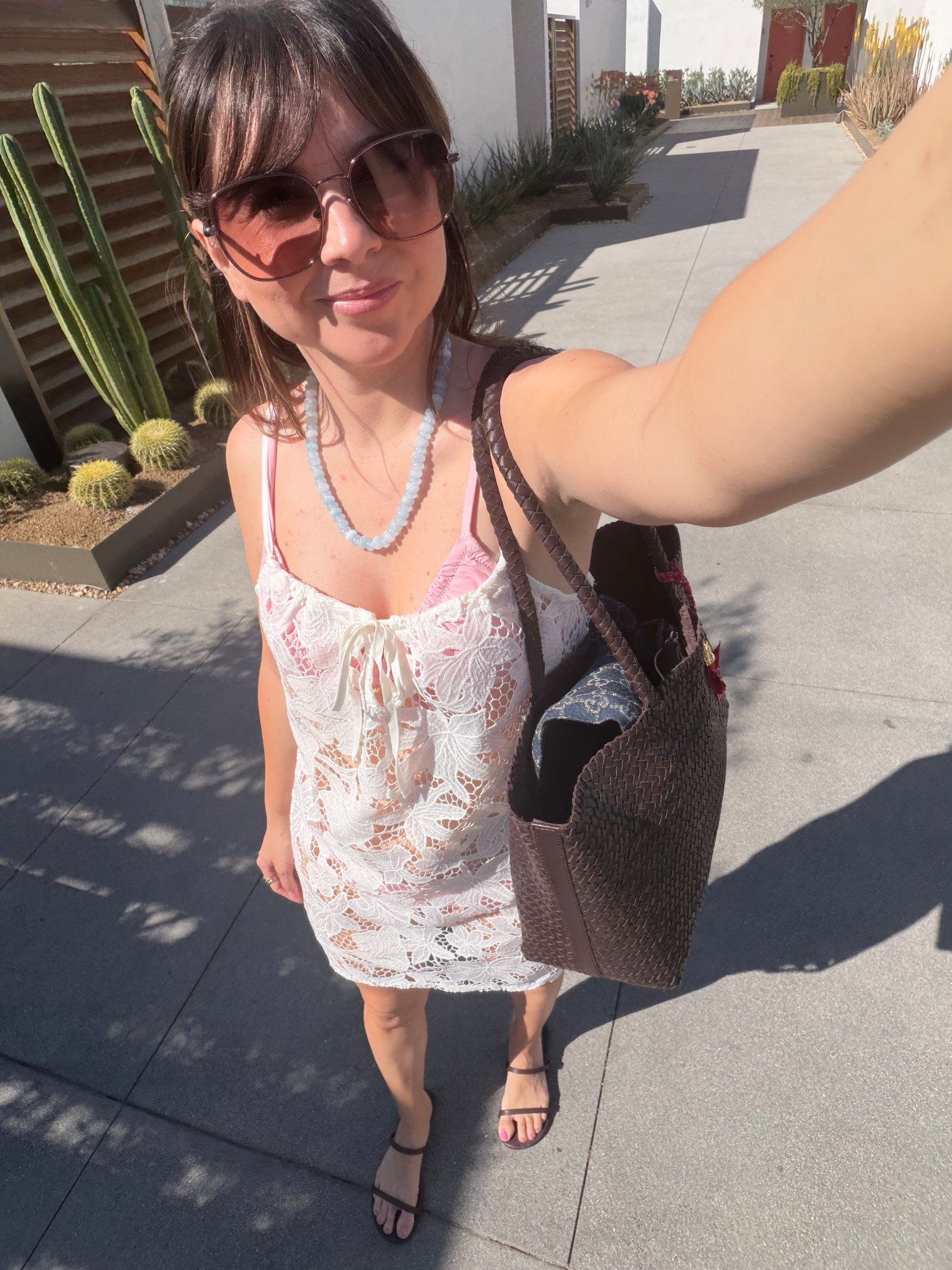 A lace mini dress that actually works for petites (I’m 5’2). Styled with simple black sandals and a woven tote for an easy polished outfit.

Xs cover up 
Bikini XS 

#LTKSwim #LTKootd