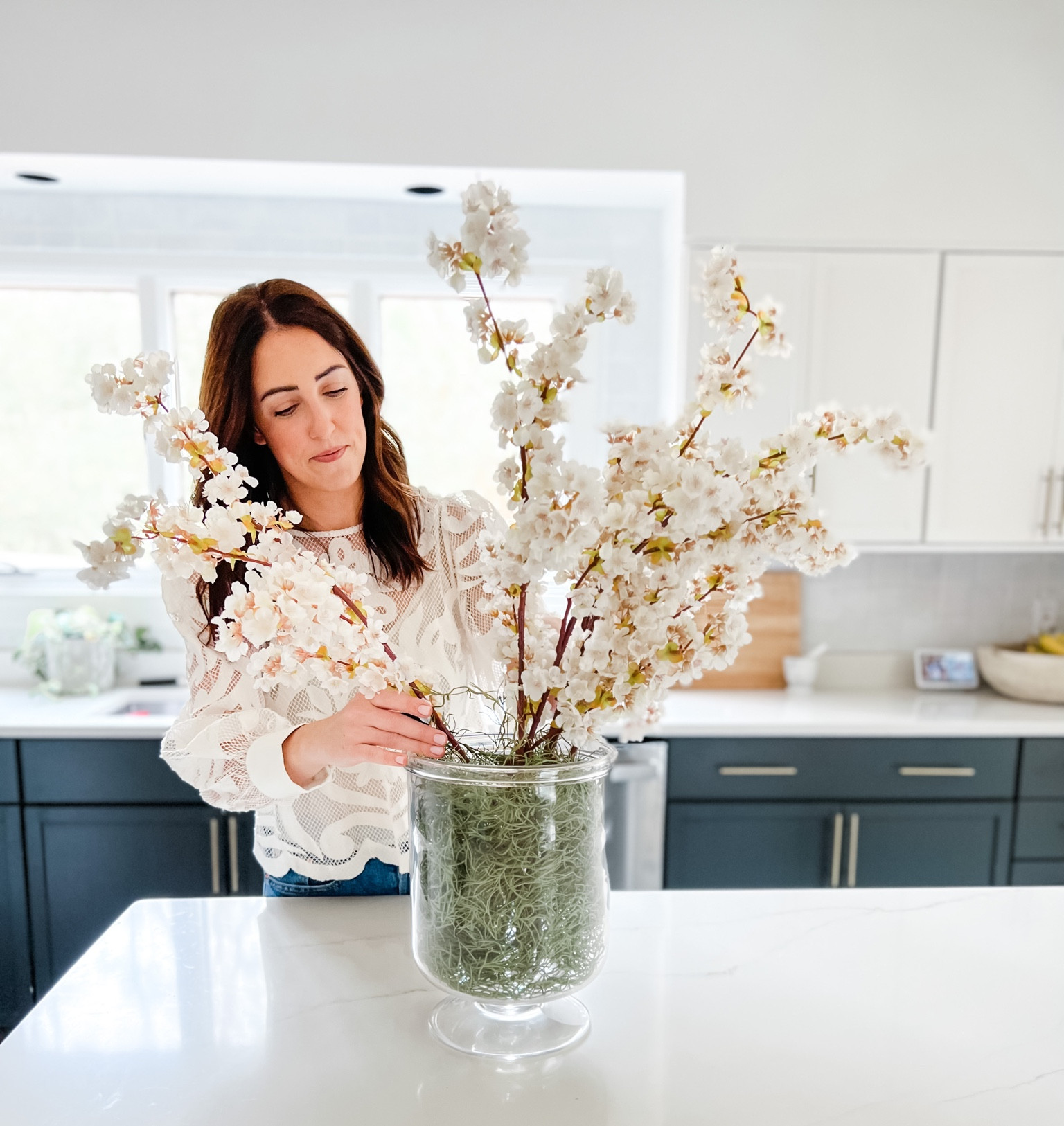 The perfect arrangement for Spring! 
Cherry blossoms, tablescape, centerpiece, floral arrangement, flowers, fake stems, floral stems, faux stems, Amazon finds, Target finds, home decor, hostess, party decor, glass vase, hurricane vase


#LTKunder50 #LTKhome #LTKSeasonal
