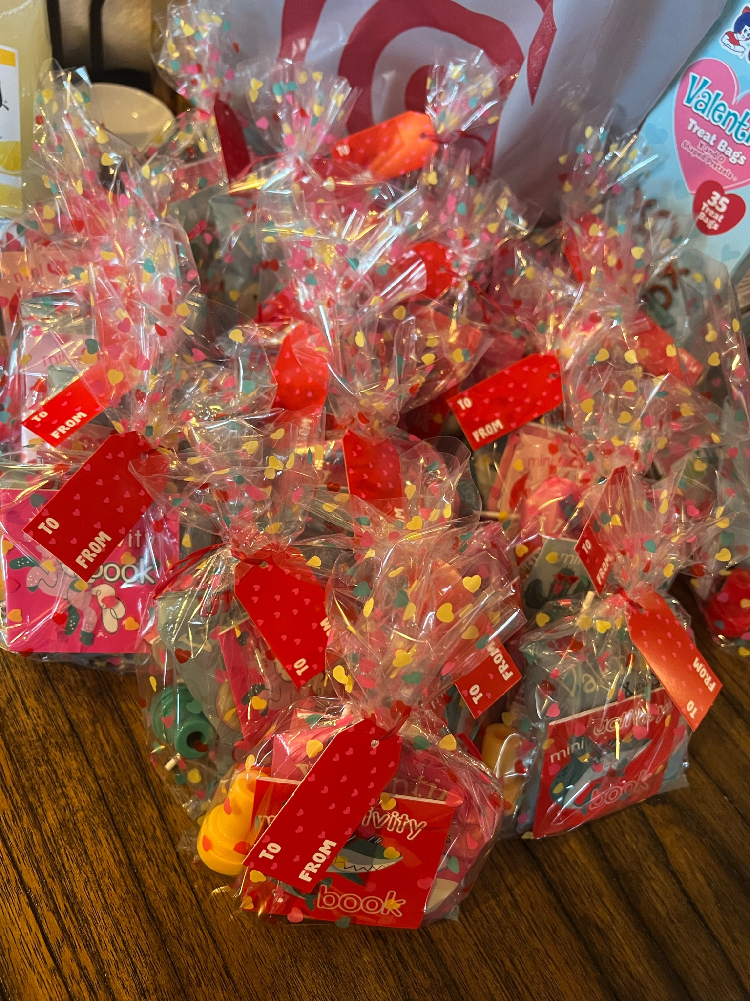 Valentine goodie bags for Theo’s classmates! We also got the yum earth heart gummies but can’t seem to find them at target.

#LTKParties #LTKSeasonal #LTKKids