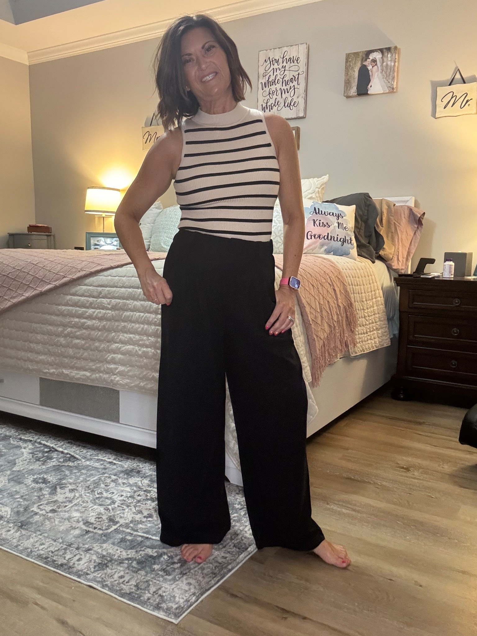 Stripes + wide leg trousers = instant chic ✨ This sleeveless striped knit tank is such a timeless staple — it gives effortless Parisian chic vibes while still being practical for everyday wear. Paired with these flowy black wide leg pants, it’s one of those outfits that looks polished but feels like loungewear (my favorite kind 🖤).

This combo is perfect for a business casual outfit that transitions from the classroom to the office to dinner with friends. Teachers — this is such a great teacher outfit inspo because it’s comfortable enough for long days, but elevated enough to look professional. The best part? Both pieces are incredibly versatile:
✔️ Layer the tank under a blazer or cardigan for fall
✔️ Swap sneakers for heels or loafers depending on the occasion
✔️ Mix and match the trousers with tees, button-downs, or cozy sweaters

If you’re building a wardrobe of timeless staples, these two are must-haves. Everything is linked in my LTK, including a few similar Amazon fashion finds that give the same elevated look without the price tag.

#AmazonFashion #LTKStyle #BusinessCasual #TeacherOutfitInspo #WideLegPants #StripedTank #ClosetStaples #ElderMillennialStyle

#LTKWorkwear #LTKOver40 #LTKStyleTip