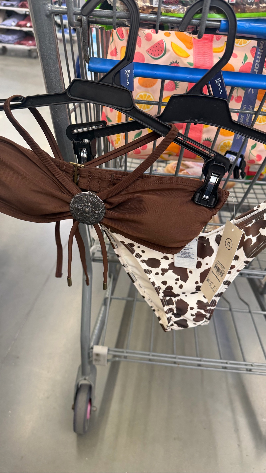 Western bathing suit bikini.

Bandeau style with a halter top - 

I LOVED this combo together. Would look really cute with a cowgirl hat, a denim mini too with some boots 🤠

Bathing suit | country | western | bikini | swim | 2026 swimwear | pool | beach | resort | vacation | affordable budget | Walmart | brown | cow | country concert | Nashville | Arizona | Texas | boho

#LTKTravel #LTKSwim #LTKSeasonal