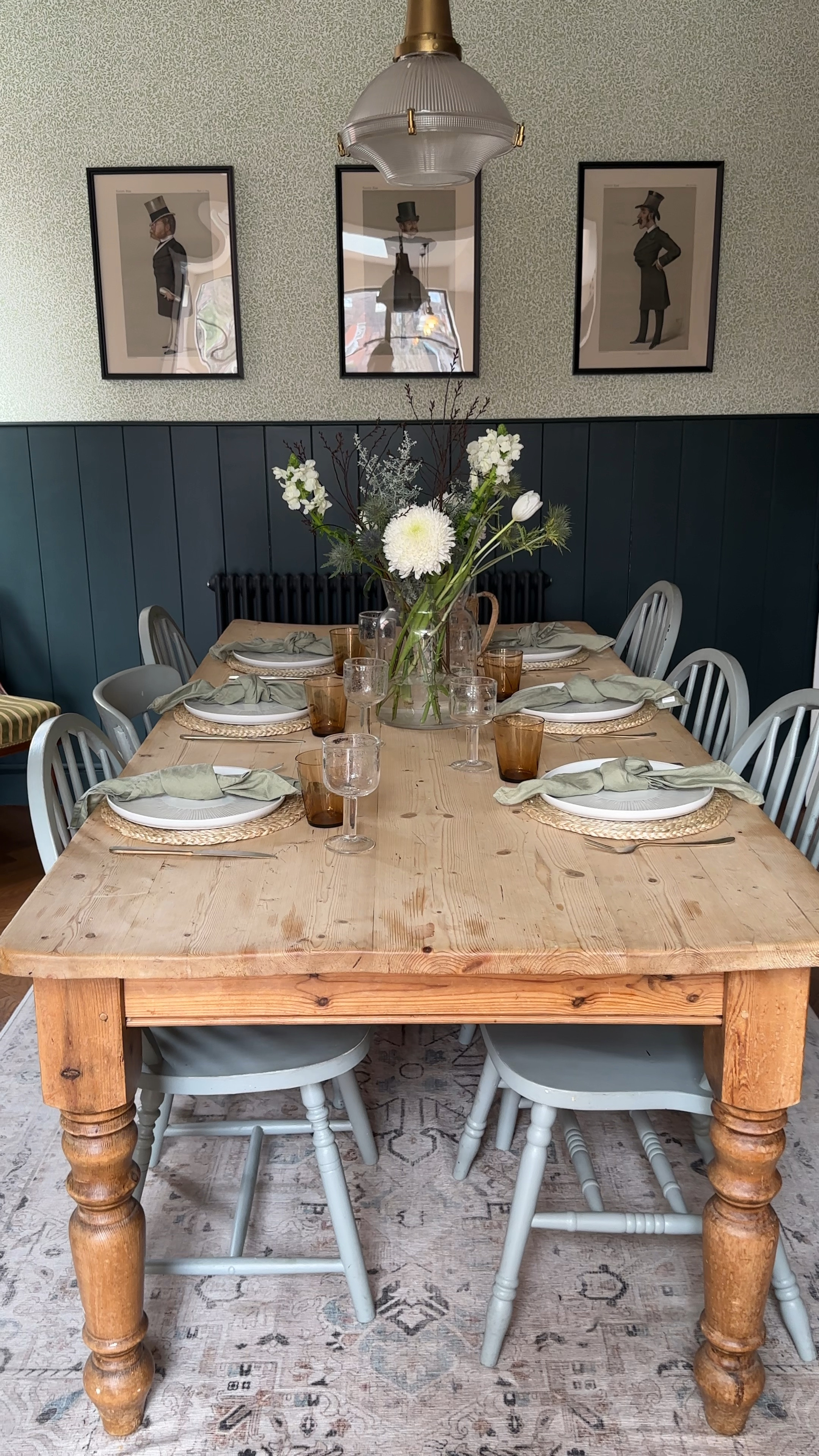 Green dining room with wallpaper, farmhouse dining table, vanity fair prints, linen napkins, neutral dinner service, gold cutlery and flowers.

Traditional decor | vintage home style 

#LTKeurope #LTKhome