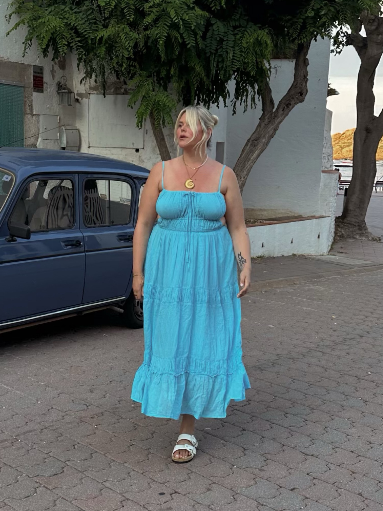 Day 6 of 7 Spain outfits 🫶🏼 love the color of this flowy Free People dress!