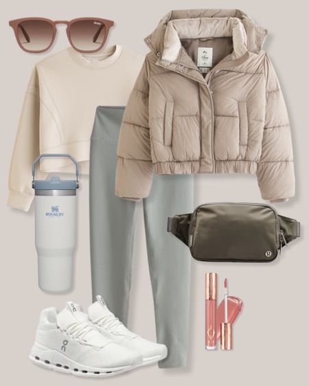 Neutral athleisure outfit
Neutral outfit
Neutral casual outfit
Casual winter outfit
Abercrombie outfit
Beige puffer jacket
Cropped puffer jacket
Beige sunglasses
Beige sweatshirt
Beige cropped sweatshirt
Crew neck sweatshirt
Sage leggings
Light green leggings
Stanley IceFlow tumbler
Lululemon Everywhere belt bag
Lululemon belt bag
White sneakers
On Cloud sneakers
White running shoes
Pink lip gloss
Matte lip gloss

#LTKSeasonal #LTKstyletip #LTKfitness