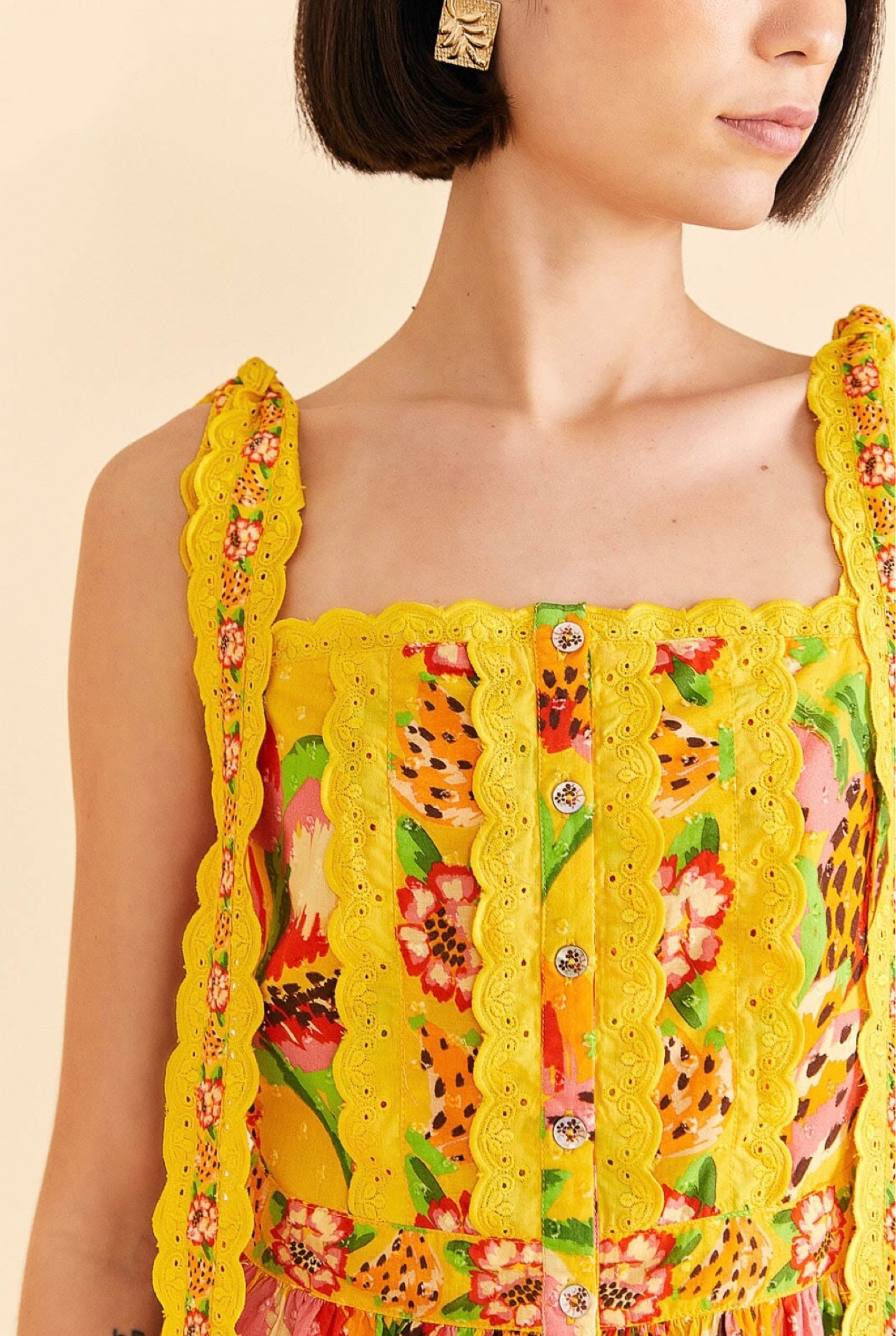 This happy top would be so fun for summer with its tie-straps, scallops and other sweet details. 

#LTKtravel #LTKSeasonal #LTKFind