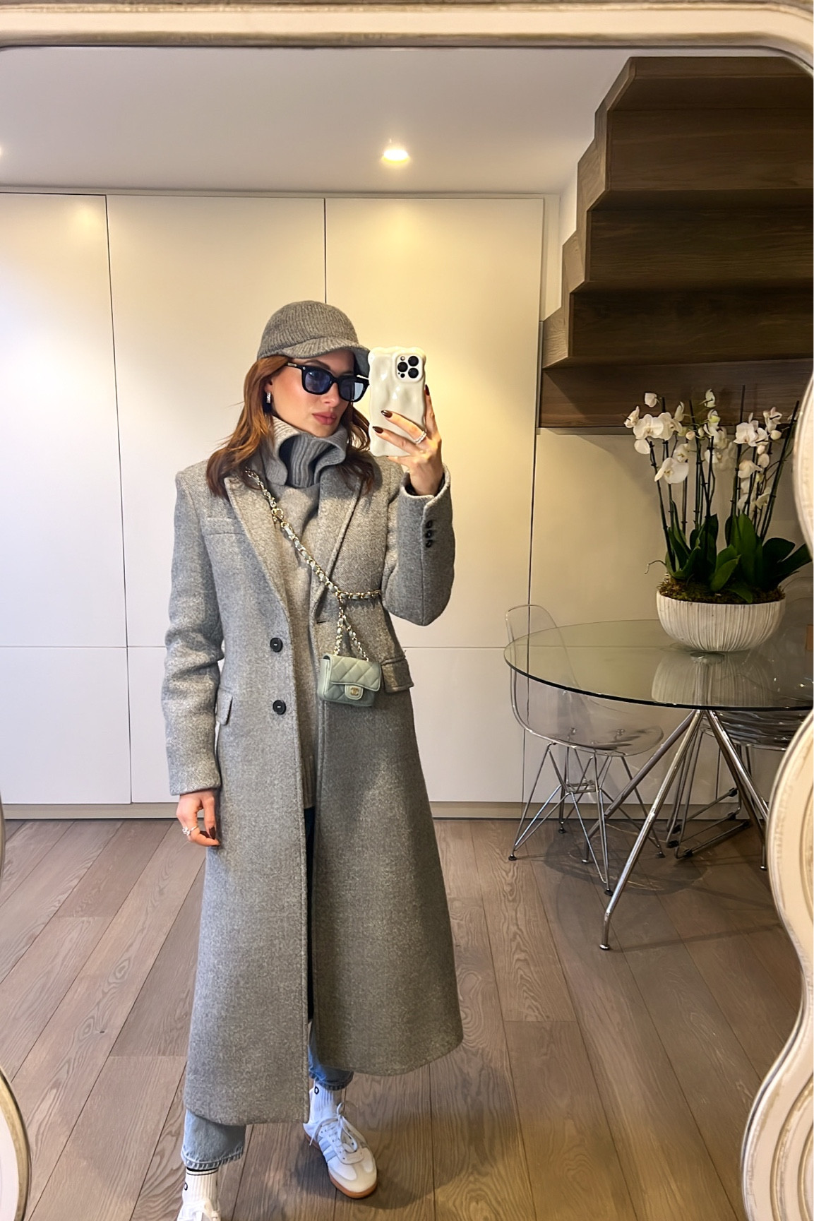 Grey coat, roll neck jumper, cap, white samba trainers, crossbody mini bag

#LTKSeasonal #LTKeurope #LTKstyletip