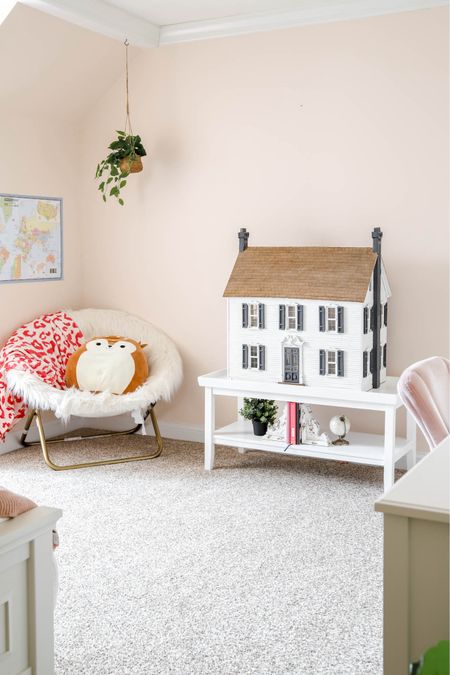 This white coffee table is a perfect place to display the miniature dollhouse we built together. The cozy white chair beside it is also a great addition.

#LTKhome