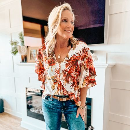 This has been my favorite addition to my fall wardrobe. I know some of you may think it doesn’t look “fall like” but when you live in Florida it qualifies! Lol! 

The tropical leaves are a pretty fall shade. 😉 I love the dolman sleeves. Has a great v-neckline, button-front closure. I think it pairs perfectly with jeans. Plus it’s currently on sale! 🙌🏻

Also, Madewell is having an exclusive sale. Which are what I am wearing here, Mid-Rise Perfect Vintage 

Casual tops 
Palm print
Madewell jeans 
Bracha Initial Pendant Necklace 



#LTKHolidaySale #LTKover40 #LTKsalealert