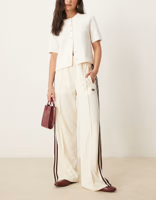 adidas Originals Firebird Loose track pants in cream and burgundy | ASOS (Global)