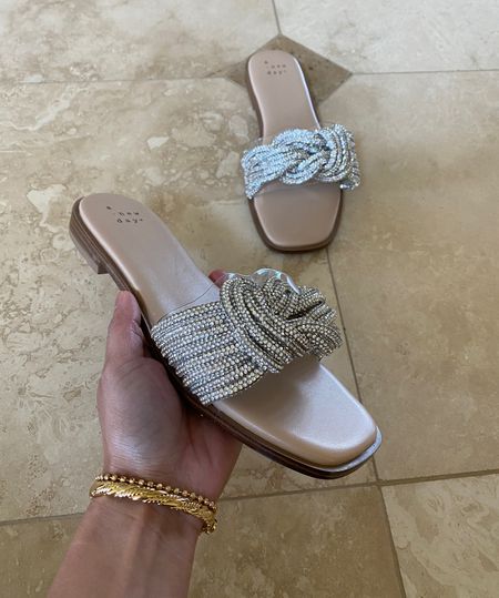 Slide sandals. I wear between a 6 and 6.5 and took a 6 in these. Look like Steve Madden  
Code HINTOFGLAM to save on bracelets  

#LTKshoecrush #LTKunder50 #LTKwedding