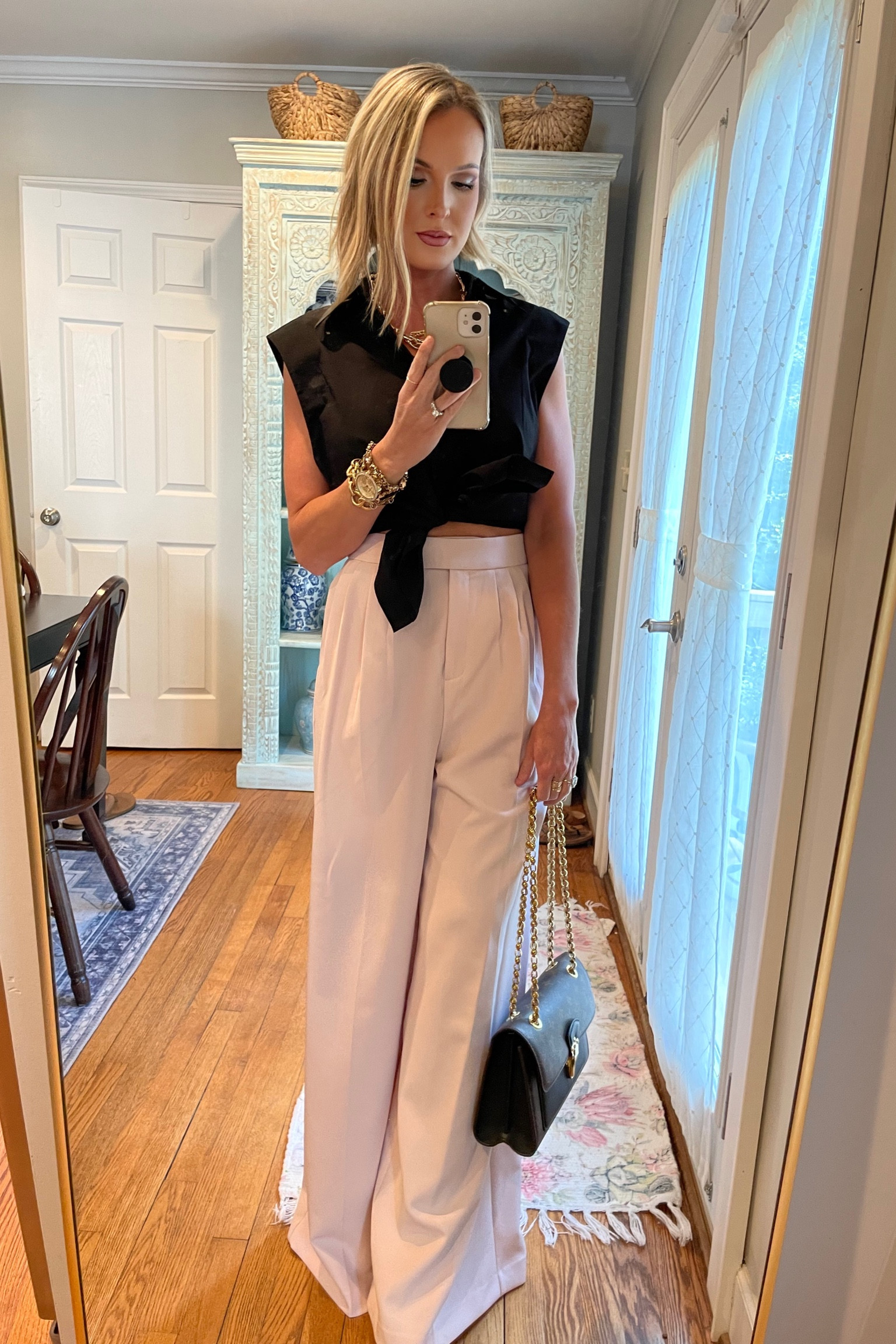 Date night, express top, button down top, tied top, wide leg pants, wide leg dress pants, trousers, gold watch, gold necklace, workwear, black top, fall top

#LTKworkwear #LTKsalealert #LTKFind
