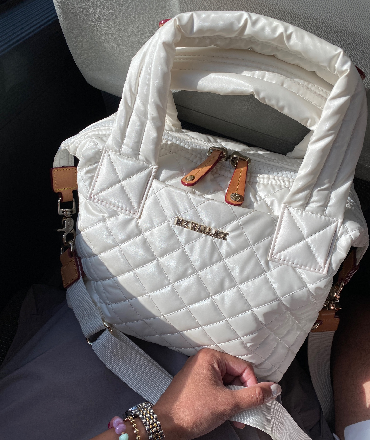 Vacation outfit  Spring outfit. Travel bag. Crossbody bag. Lightweight with lots of organizational details. This color is called pearl metallic. 

#LTKitbag #LTKover40 #LTKtravel