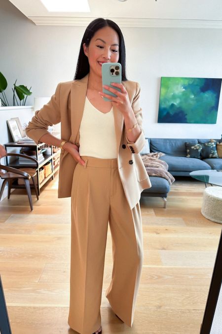 My favorite way to make a suit more approachable is to wear a knit tank under the blazer instead of a button down shirt. 

#blazer
#trousers
#springworkwear
#classicstyle
#styletip

#LTKstyletip #LTKworkwear #LTKSeasonal