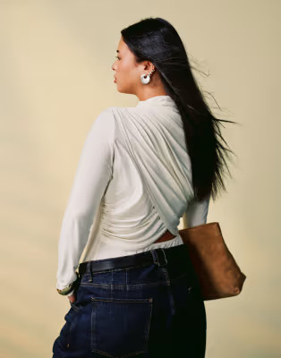 ASOS DESIGN Curve high neck drape long sleeve bodysuit in pale yellow | ASOS (Global)