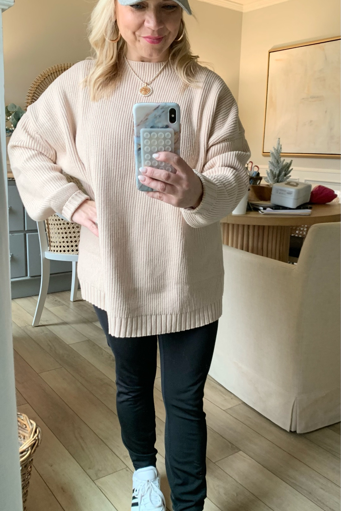 I can’t speak highly enough about this soft oversized sweater that comes in many colors along with these Adidas shoes. I wore these shoes all around market for three days straight without any blisters so comfortable. This necklace is an Urban Dolly must have . 
#amazon#adidas#ootw#outfitover40#omahainfluencer