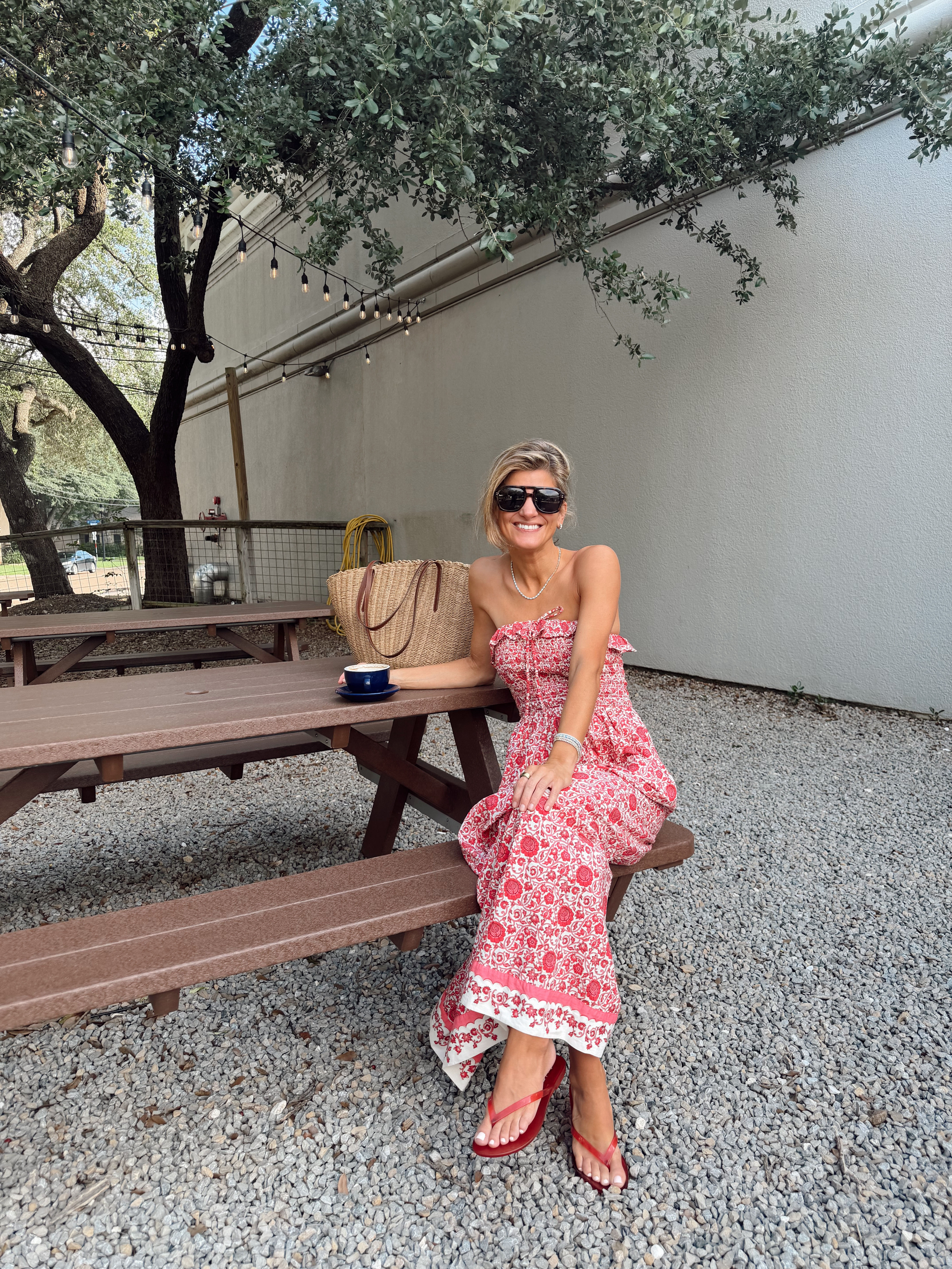 Target Strapless Pink Floral Maxi Dress (wearing XS) paired w Madewell Red Jelly Sandals and J.crew Tote 

 