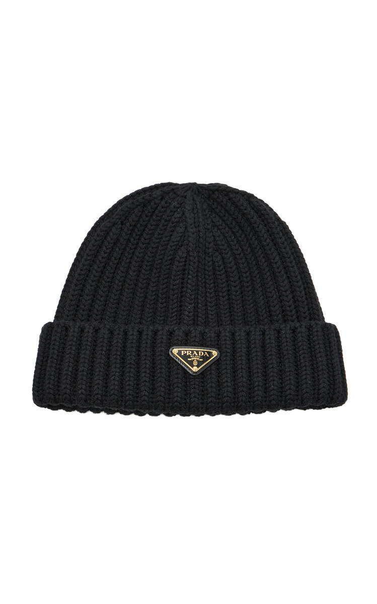Prada

Ribbed-Knit Beanie

$595
Color
—
Black

Select a size

ADD TO BAG

ADD TO FAVORITES
EDITOR'S NOTE
Miuccia Prada and Raf Simons reimagine the brand's archival accessories to create a fresh, sophisticated and endlessly cool collection for today and tomorrow.
PRODUCT DETAILS
Dry clean
Made in Italy
Product Code 1048480
SHIPPING & RETURNS
SeeHoliday Shipping ScheduleFor Your Location
This item only ships within United States of America
$10.00 Standard Shipping
Ship to:
United States of America

Change
Enter a Zip/Postal Code for a delivery estimate

UPDATE
Item is returnable within 28 days for a full refund. Learn more.
 | Moda Operandi (Global)