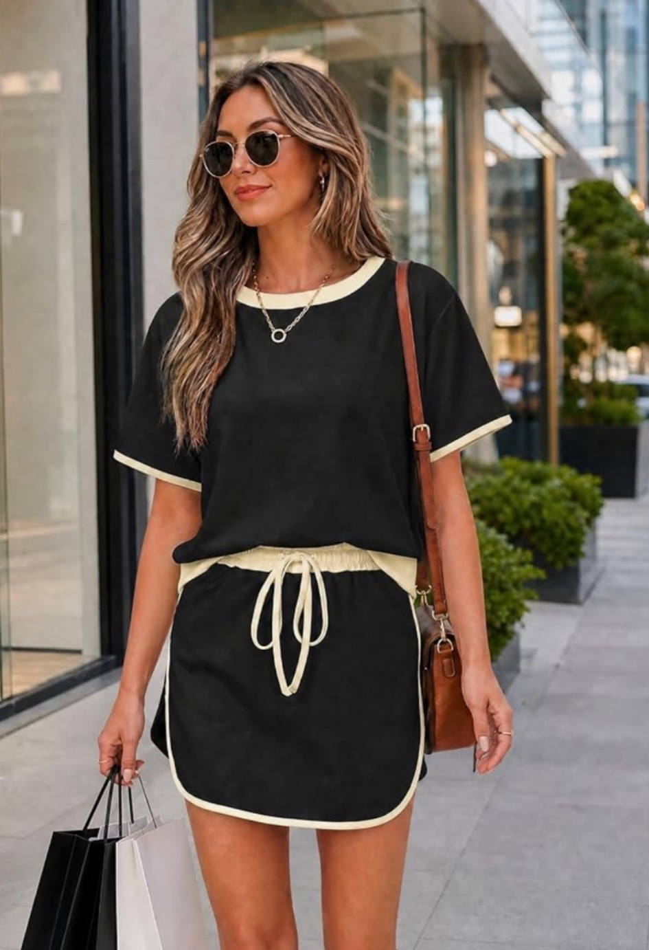 The matching set that makes casual summer dressing easy. 🖤 This skort set is perfect for running errands, travel days, weekend outings, coffee runs, sightseeing, casual lunches, walks around town, and everyday wear. The drawstring skort gives you the comfort of shorts with the look of a skirt, while the color block design keeps it fun and sporty. 

One of those effortless outfits you'll throw on and instantly feel ready for the day. ✨

#LTKOver40 #LTKSeasonal #LTKMidsize
