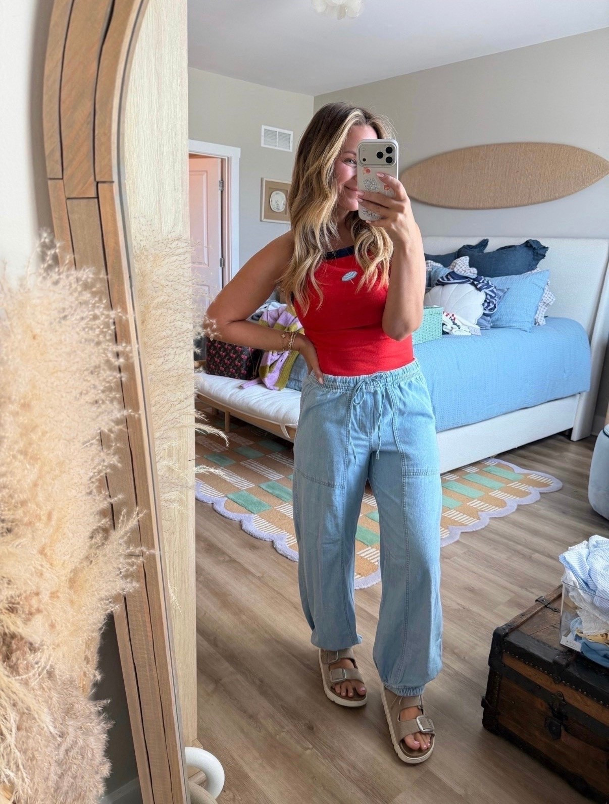 Red, white & cute ❤️🤍💙

This outfit is giving effortless summer style. The pop of red tank, lightweight chambray joggers, and comfy buckle sandals are the perfect combo for everything from weekend errands to backyard BBQs. Easy, flattering, and comfortable enough to wear all day long.

#summeroutfit #casualsummerstyle #redwhiteandblue #memorialdaystyle #fourthofjulyoutfit #chambraypants #everydayoutfit #momstyle #comfortablefashion #summerfashion #affordablestyle #weekendoutfit #ltkfashion #ltkstyle #amazonfashion