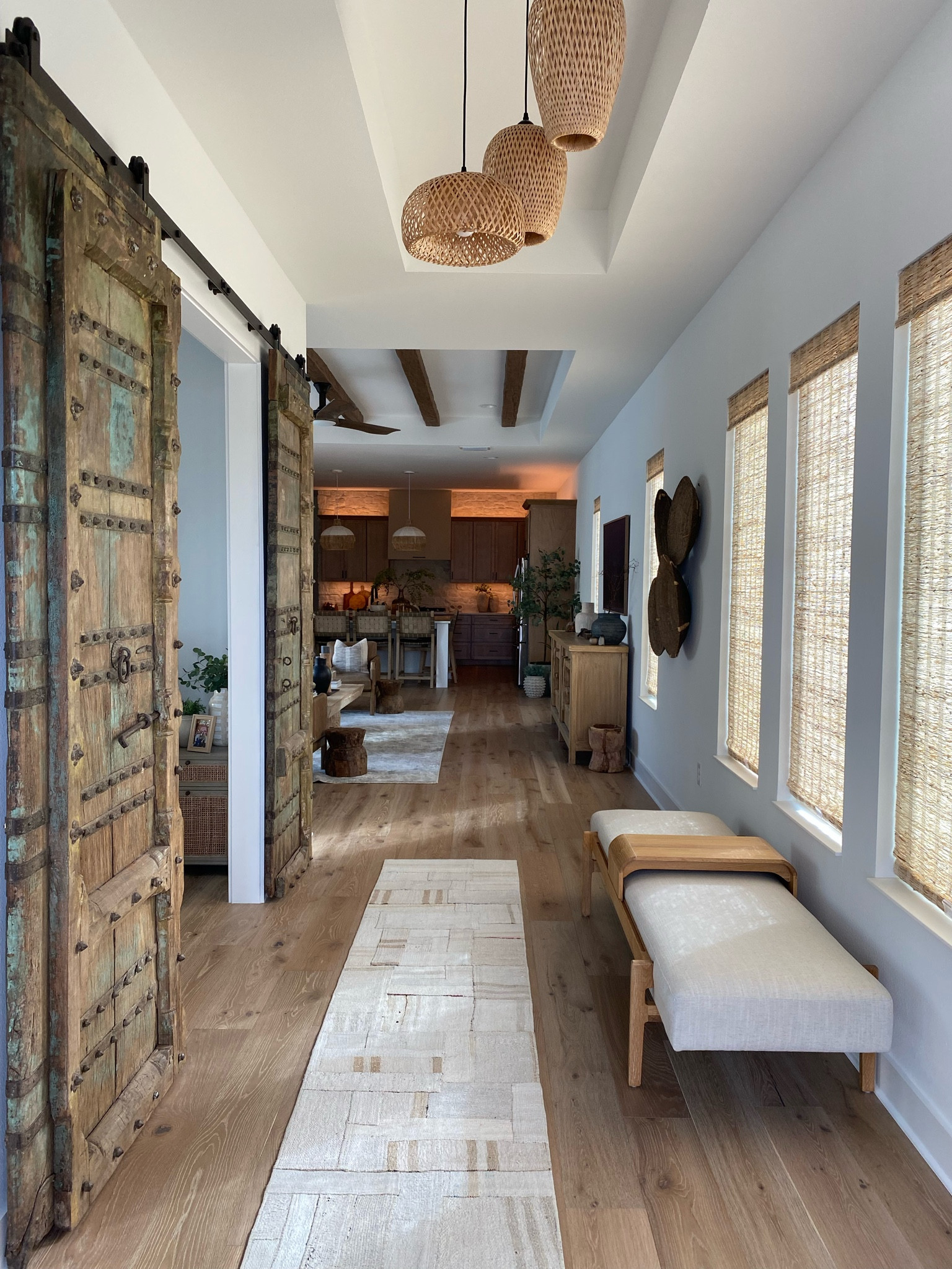 This bench made my heart swoon when I first saw it and started planning for this space.  It did not disappoint!  

The vintage Kilim rug and bamboo chandelier finish off the space.

#LTKSaleAlert #LTKHome #LTKSummerSales
