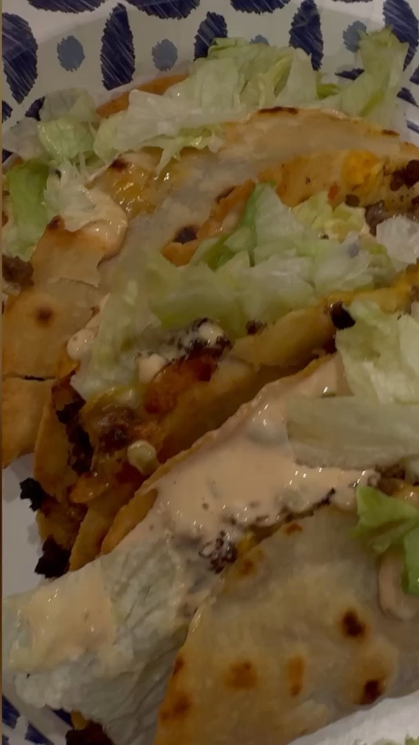 Cheeseburger tacos 

Ingredients:

1lb ground beef 
1 large yellow or sweet onion 
1 tbsp Worcestershire 
1 tbsp tomatoe paste 
3-4 tbsp yellow mustard 
Salt and pepper to taste 
Cheese (i use a block of Colby jack & make in slices)   
Siete almond flour tortillas (or whatever tortilla of your choice)
Iceberg lettuce 
Olive oil

Thousand island sauce:
1 cup mayo or Greek yogurt 
3 tbsp ketchup 
1 tsp sugar
1 tsp white vinegar
A massive amount of dill relish haha literally as much or as little as you want but i load mine up. 

Recipe:

Preheat oven to 400 degrees. 
In a large skillet on high heat add your olive oil mustard and ground meat. Once it’s cooked add in your tomato paste, Worcestershire, salt/pepper and caramelized onions. Mix well and set aside. In another skillet on medium/low heat, in a very minimal amount of oil - cook your tortillas on both sides so that they are soft & pliable. Fill your tortillas with the meat mixture, add slices of cheese, fold in half  set on a baking sheet. I lightly mist my tacos with avocado oil and sprinkle a little salt on them before i place them in the oven. Bake at 400 for 15 min then flip and bake an additional 5 min. Let them cool for a few minutes before dressing them with the thousand island sauce and lettuce. Enjoy!

#LTKhome #LTKfamily #LTKVideo