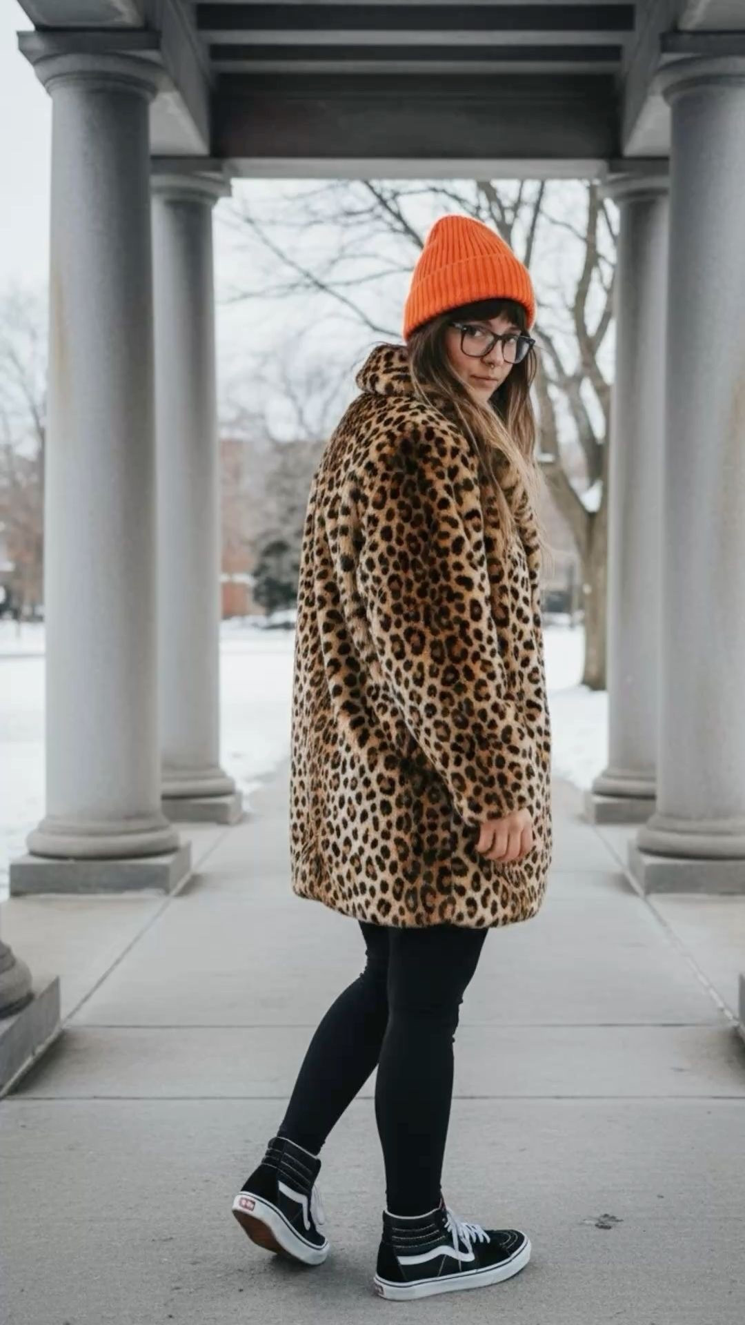 Leopard print is officially a neutral for Winter 2026! I’m obsessed with how this faux fur coat elevates a simple base of black leggings and high-top Vans. The secret to making animal print look modern? Adding a bold, high-contrast accessory like this ribbed orange beanie. It’s cozy, chic, and perfect for those snowy city walks.

#LTKSeasonal #LTKootd #LTKgrwm