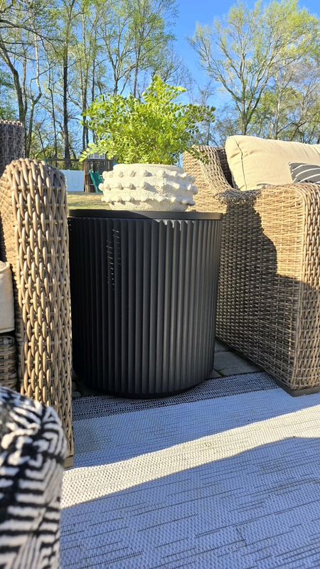 Fluted outdoor sidetable, but make it a cooler?Yes, please!   I desperately needed a new table and instantly loved the look of this one.  It comes in white,  black,  tan, and gray. We will definitely be using this thing all summer long! I found this one on Amazon, but I've seen them offered by other retailers. 

