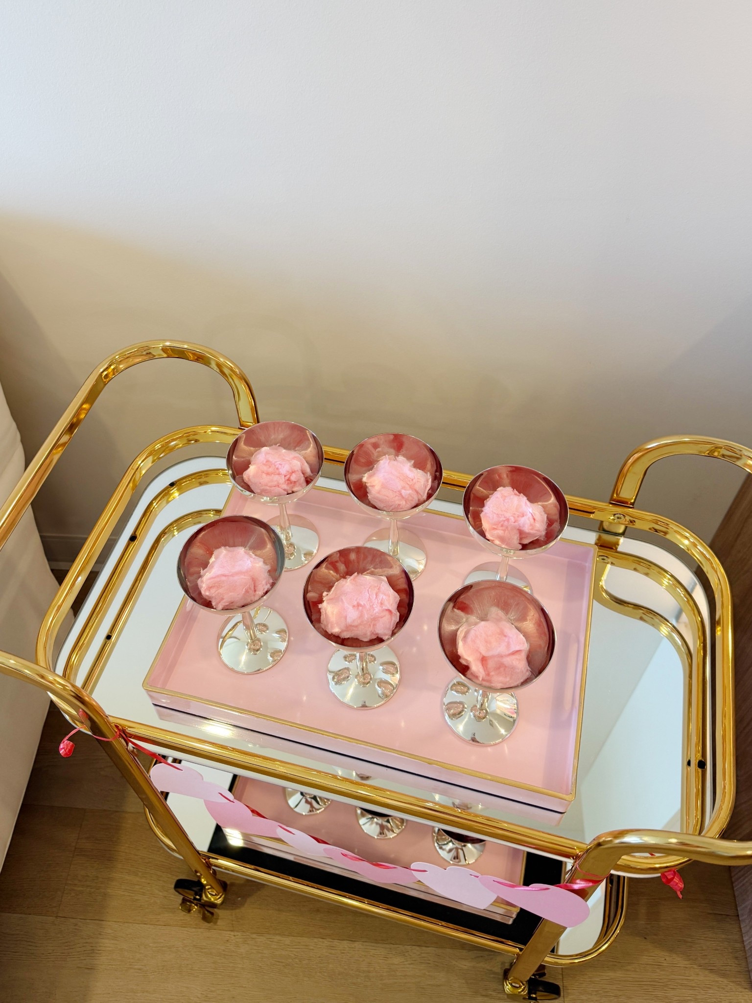 My silver coupe glasses from CB2 are absolutely perfect for a chic little ladies’ party! ✨ We paired them with bubbly champagne and the prettiest pink cotton candy from Amazon for a fun, flirty touch. Both are linked below so you can recreate the look