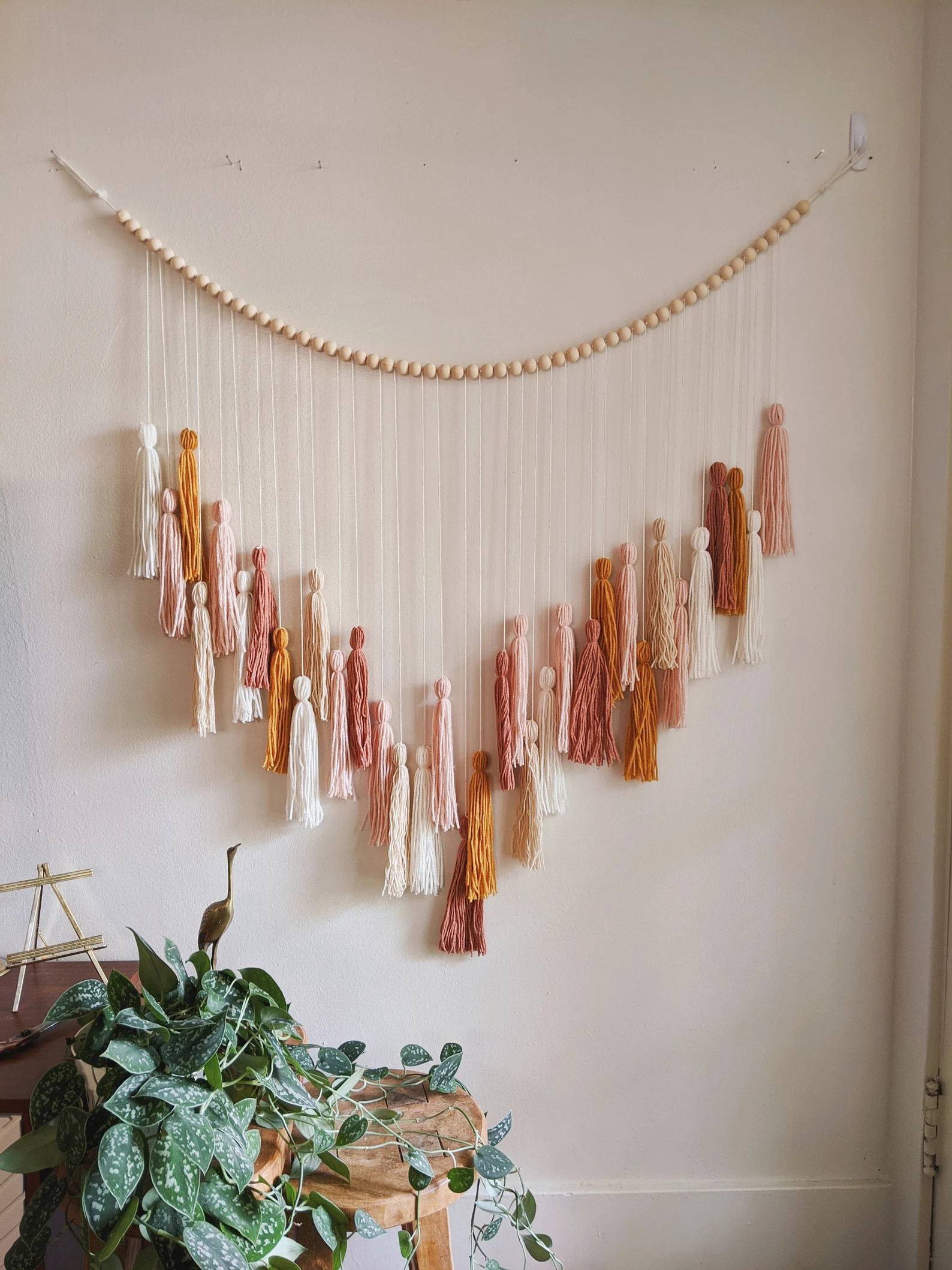 Blush and mustard yarn tassel wall hanging / Earth tone fiber art / Boho wall decor / Girls Nurse... | Etsy (Global)